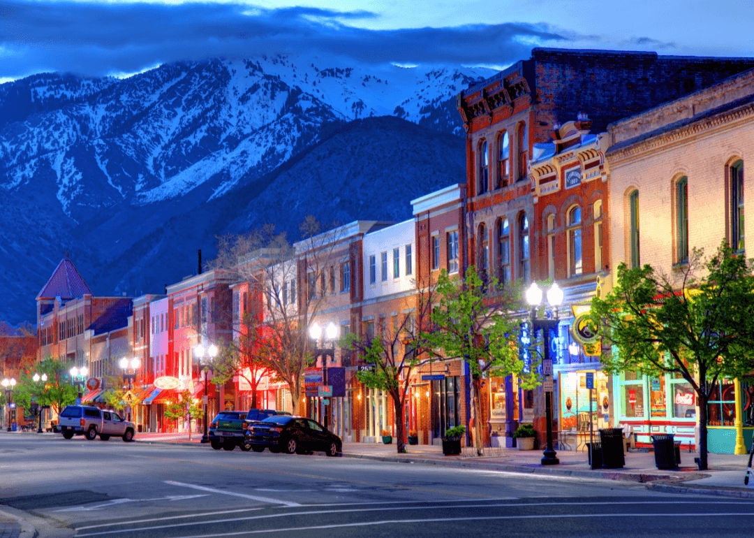 Mountain town in Utah with snowcapped peaks in the background