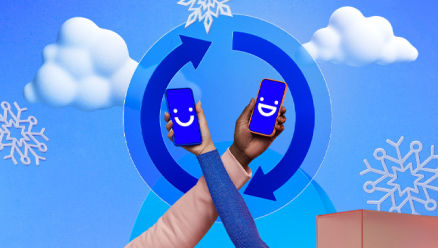 two visible phones held in front of snowflakes