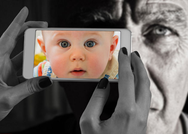 picture of a baby on a phone
