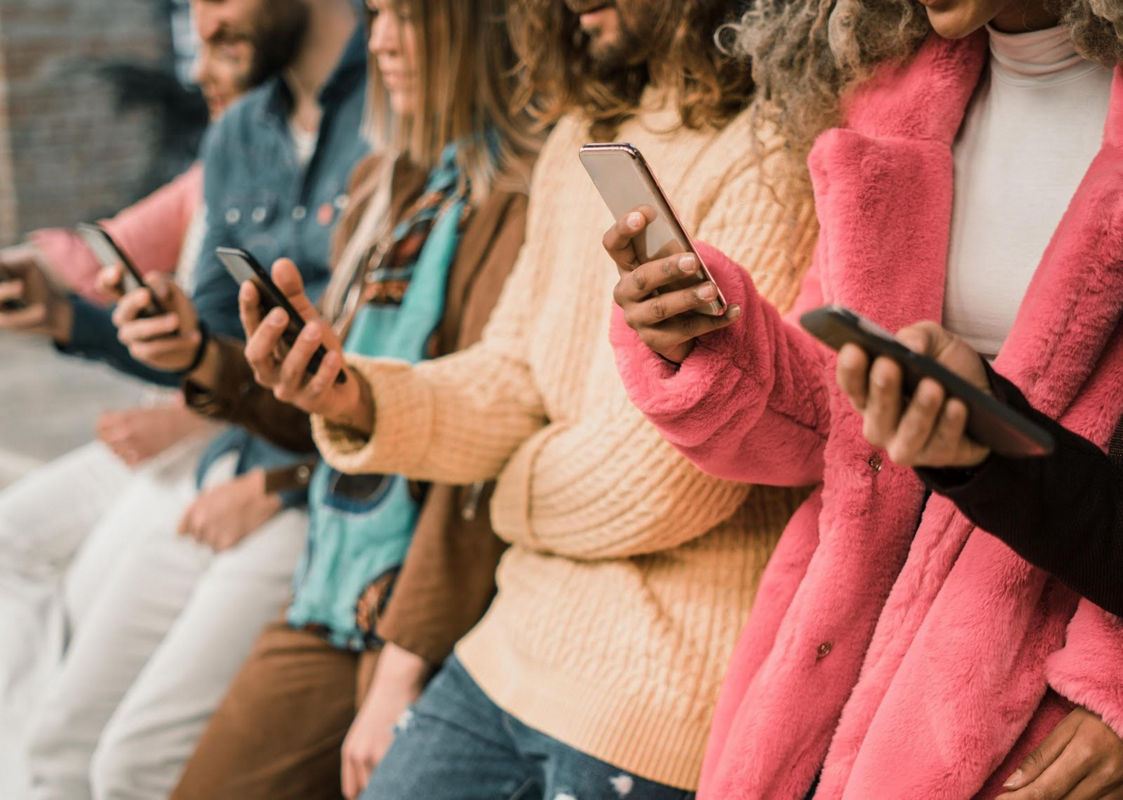 group of people with smartphones