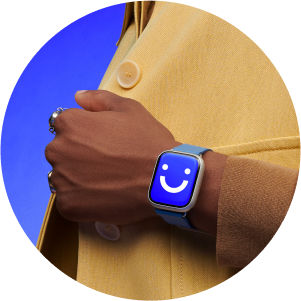 close up of a smart watch displaying a smile emoji