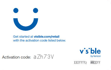 Phone with visible smiley emoji held in front of blue light